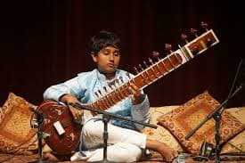 Student Playing sitar